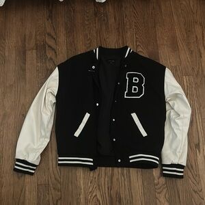 Black and white leather man  jacket,